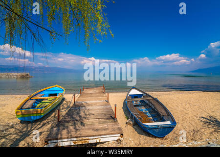 Small boats on the shore of Lake Ohrid in Sveti Naum, Republic of Macedonia Stock Photo