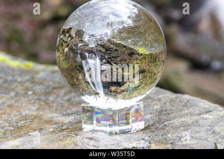 Crystal ball view of Melincourt Water Fall in full February flow. Stock Photo