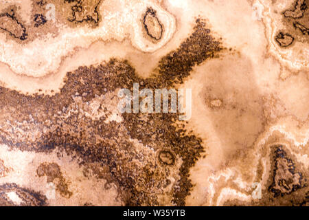 Marble slabs with striking brown pattern on a light background Stock Photo