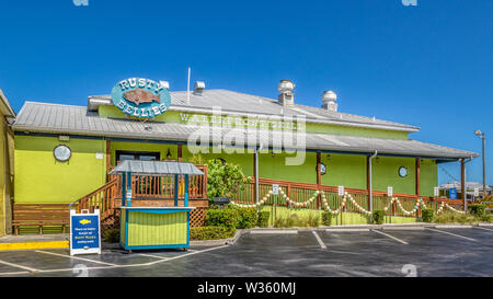 Tarpon Springs, Florida. Rusty Bellies bright green waterfront grill seafood restaurant. Stock Photo