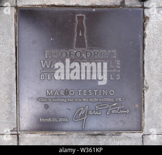 LOS ANGELES, CA/USA - July 8, 2019: Plaque honoring fashion photographer Mario Testino on the Rodeo Drive Walk of Style Stock Photo