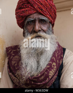 JAIPUR, INDIA - CIRCA NOVEMBER 2018: Indian man with typical clothing of Rajasthan in Jaipur. Jaipur is the capital and the largest city of the Indian Stock Photo