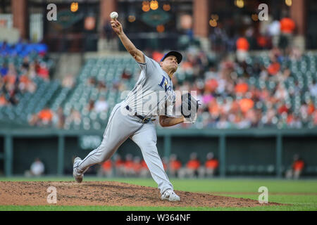Baltimore, MD, USA. 12th July, 2019. Tampa Bay Rays relief pitcher Yonny Chirinos (72) delivers a pitch during MLB action between the Tampa Bay Rays and the Baltimore Orioles at Camden Yards in Baltimore, MD. Jonathan Huff/CSM/Alamy Live News Stock Photo