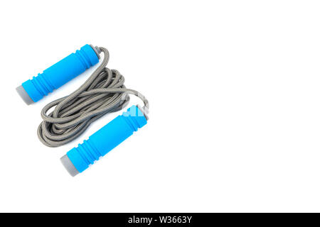 Skipping rope or jumping rope isolated on white background. Selective focus and crop fragment Stock Photo