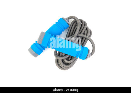 Skipping rope or jumping rope isolated on white background. Selective focus and crop fragment Stock Photo