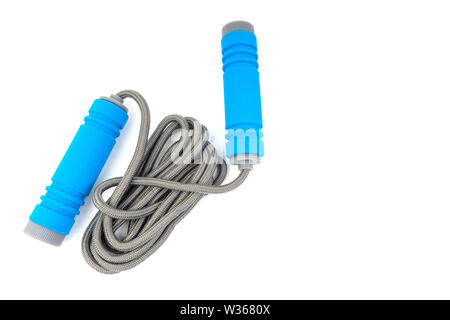 Skipping rope or jumping rope isolated on white background. Selective focus and crop fragment Stock Photo