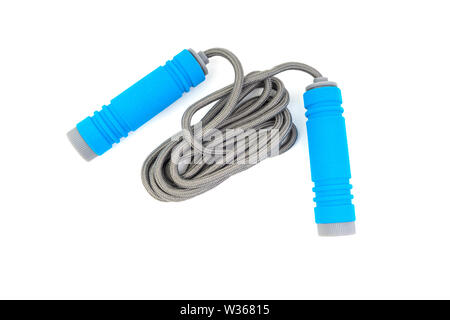 Skipping rope or jumping rope isolated on white background. Selective focus and crop fragment Stock Photo