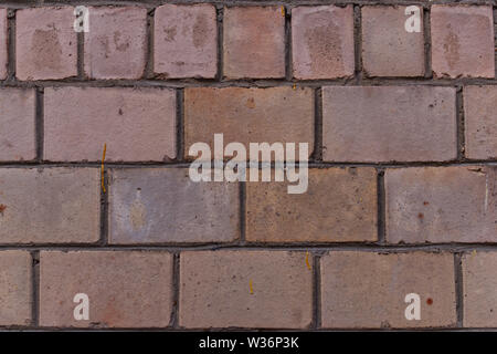 Abstract image texture for designers with delicate pink stones and cement. Horizontal lay figure. Stock Photo