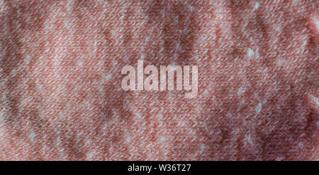 Macro closeup of a soft pink cotton fabric, clothing material, Textured background Stock Photo