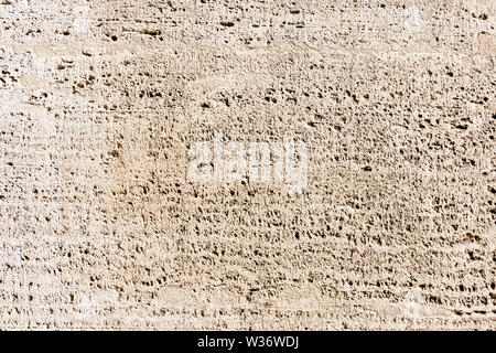 Empty concrete wall texture background, beige colour. Stock Photo