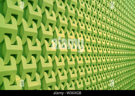Neon green diminishing perspective of wall surface pattern and texture Stock Photo