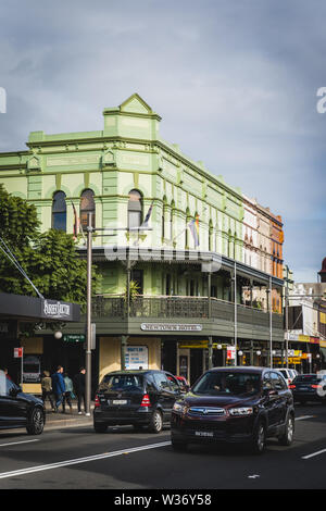 Sydney, New South Wales, Australia - JUNE 23rd, 2018: Weekend traffic driving past the Newtown Hotel on King Street. Stock Photo