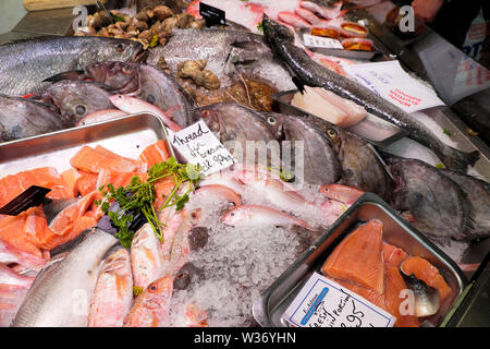 Cardiff Central Market E. Ashton Fishmonger selling fresh thread fin Bream and various fish portions in city centre of Cardiff Wales UK  KATHY DEWITT Stock Photo