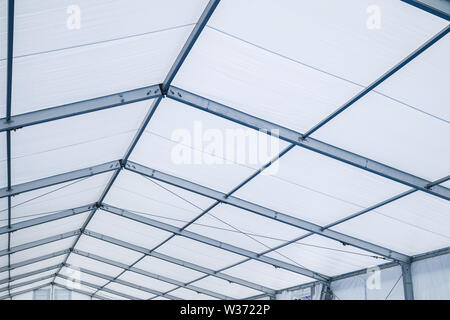 Blue Steel frame tents Background. Inside Big Canvas Tent Stock Photo