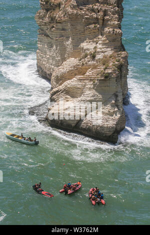 Beirut, Lebanon. 13th July 2019.   Diving contestants  jump off   the 100 metre high Pigeon Rocks in Raouche Beirut in the Red Bull World Cliff Diving Championships held over 13-14 July. Credit: amer ghazzal/Alamy Live News Stock Photo