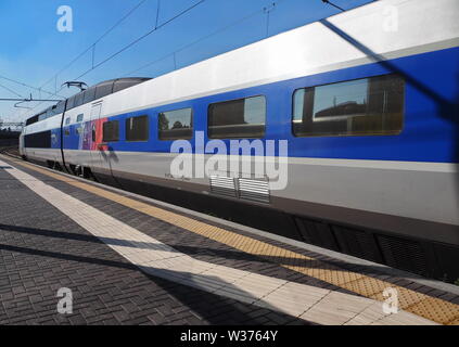 Milan, Italy: 12 July 2019: Paris-Milan High speed train SNCF TGV Lyria in Porta Garibaldi station, Milan, Stock Photo