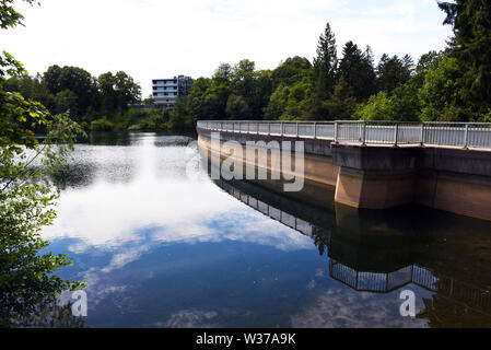 Remscheid, Germany. 10th July, 2019. The Eschbachtalsperre with the dam, which was opened in 1891, is the first drinking water dam in Germany and the Eschbach is dammed. Credit: Horst Ossinger//dpa/Alamy Live News Stock Photo