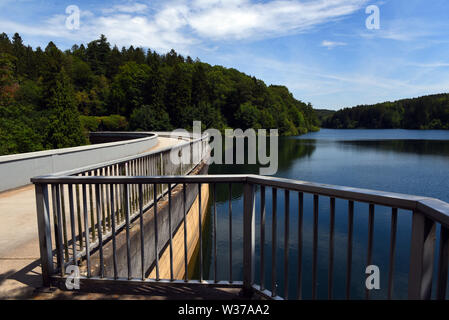 Remscheid, Germany. 10th July, 2019. The Eschbachtalsperre with the dam, which was opened in 1891, is the first drinking water dam in Germany and the Eschbach is dammed. Credit: Horst Ossinger//dpa/Alamy Live News Stock Photo