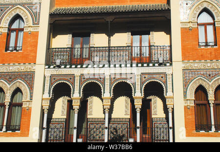 Spain- Amazing traditional architectural art and craftsmanship on the exterior of this apartment building. Stock Photo