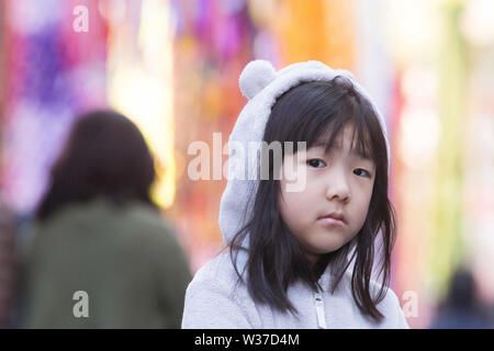 Sao Paulo, Brazil. 13th July, 2019. pedestrians take pictures in the midst of preparations for the 41st edition of the Tanabata Matsuri Star Festival which takes place in the Liberdade district on July 13 and 14 Credit: Dario Oliveira/ZUMA Wire/Alamy Live News Stock Photo