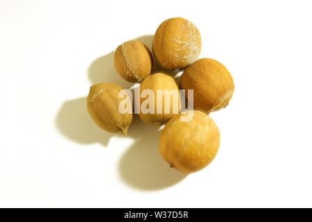 Top-down view of six aged and stale yellow lemons isolated on white background Stock Photo