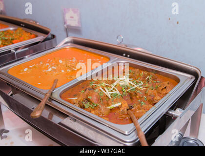 Picture of some colorful Indian curries in buffet style Stock Photo