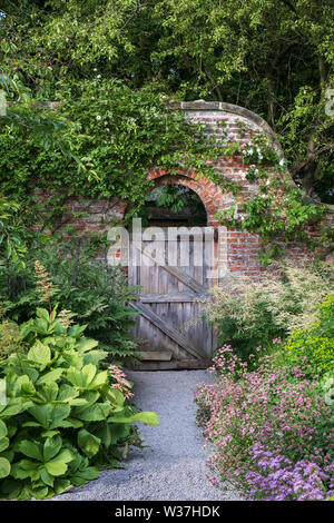 English country garden flower borders in the walled garden at Middleton Lodge hotel & Stately Home near Middleton Tyas Richmond North Yorkshire Stock Photo