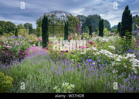 English country garden flower borders in the walled garden at Middleton Lodge hotel & Stately Home near Middleton Tyas Richmond North Yorkshire Stock Photo