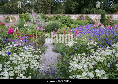 English country garden flower borders in the walled garden at Middleton Lodge hotel & Stately Home near Middleton Tyas Richmond North Yorkshire Stock Photo