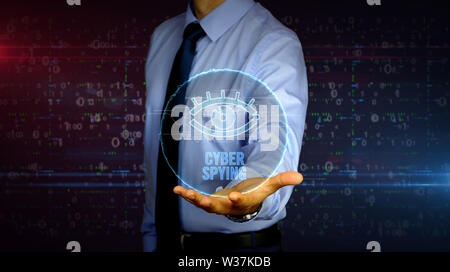 Man with dynamic cyber eye symbol hologram on hand. Businessman showing futuristic concept of digital surveillance, spying, hacking and violation of p Stock Photo