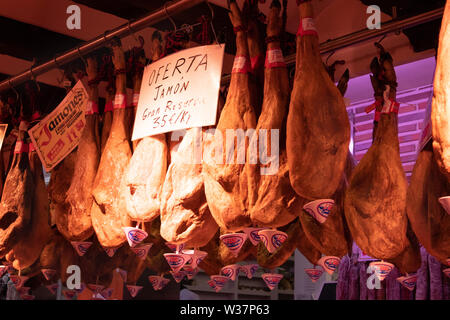Oferrta jamon cured ham joints displayed for sale Salamanca Spain Stock Photo