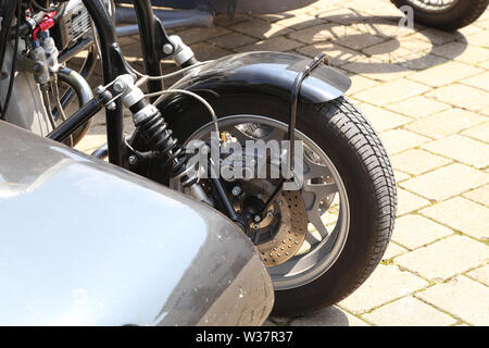 Details of a motorcycle with a stroller. Stock Photo