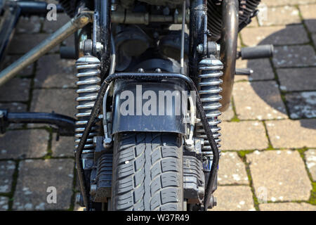 Details of a motorcycle with a stroller. Stock Photo