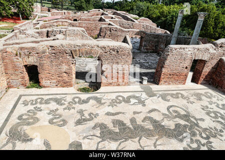Neptune Roman empire thermal spa with frigidarium and landscape in Ostia Antica - Rome - Italy