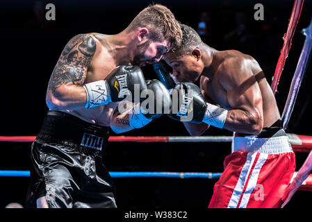 Greg Vendetti vs. Ayi Bruce at a boxing match hosted by  Murphys Boxing at House of Blues in Boston. Stock Photo