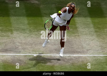London, UK. 13th July, 2019. The All England Lawn Tennis and Croquet Club, Wimbledon, England, Wimbledon Tennis Tournament, Day 12; Serena Williams (USA) serves to Simona Halep (ROM) Credit: Action Plus Sports Images/Alamy Live News Stock Photo