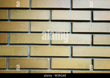 pale yellow orange brick wall bacground Stock Photo