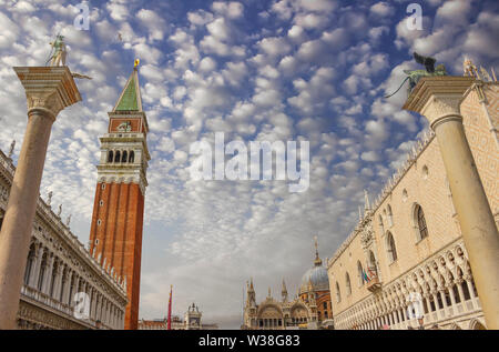 Piazza San Marco of Venice: National Library Marciana, Columns of San Marco and San Teodoro, Campanile, Doge's Palace. Stock Photo