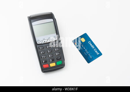 Credit card terminal on white background. Close up of payment device, card machine. Stock Photo