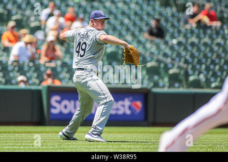 Baltimore Orioles' Trey Mancini (16), Rio Ruiz (14), Richie Martin