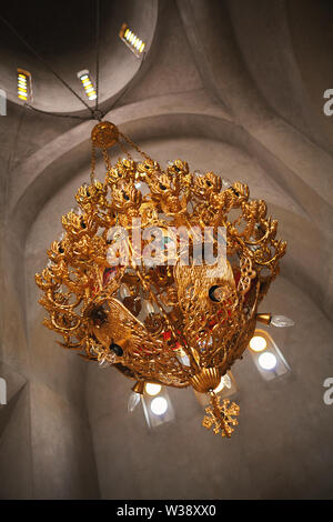 Details of gold plated chandelier in an Orthodox church. Stock Photo