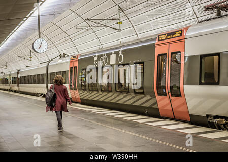 woman walking in the underground station Triangeln in Malmo, Sweden, May 23, 2019 Stock Photo