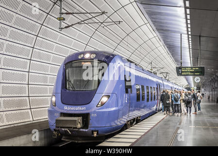 People embark a train at the underground station Triangeln in Malmo, May 21, 2019 Stock Photo