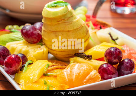 Pear, cherry and other healthy fruits on the table. Food. Stock Photo