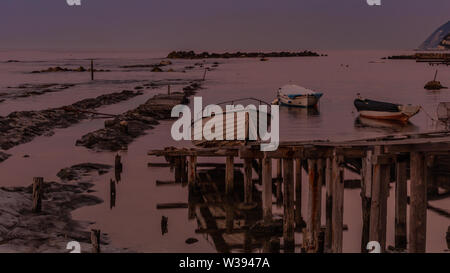 Passetto beach with fishermans' boats at evening Stock Photo