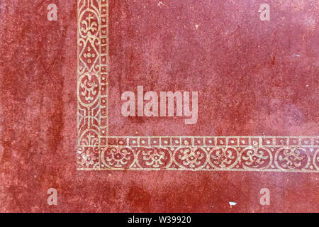 A hand painted ancient Roman pattern on stucco in Pompeii, Italy Stock Photo