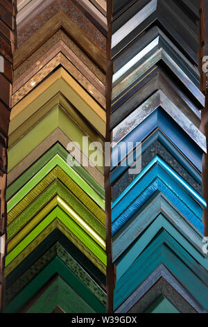 Rows of sample picture frames in a custom picture framing shop Stock Photo