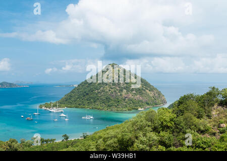 Looking out over the blue ocean and yachts from a hillside in Labuan Bajo, Flores, Indonesia. Stock Photo