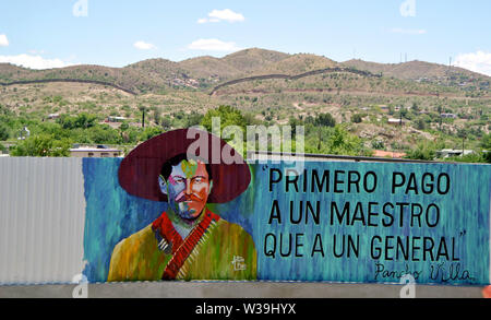 mural of general zapata in nogales arizona on the usa mexican border with the fence in the background Stock Photo