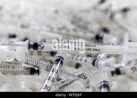 pile of used insulin needles Stock Photo